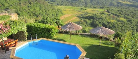 Swimming pool with fabulous garden and stunning view