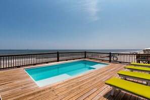 view of beach from pool