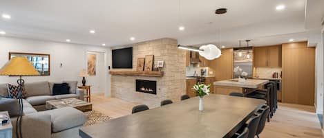 The open floor plan of this newly remodeled condo welcomes you and your travel companions to relax and embrace your getaway to Aspen!