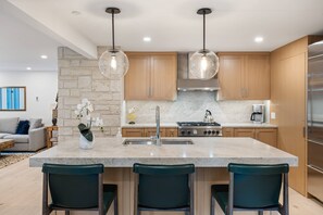 The breakfast bar in the newly remodeled designer kitchen is a great spot for catching up on plans for the day's adventures!