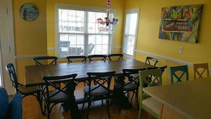 Solid oak kitchen table, pictured w/ only 1 leaf.  Seats 12 w/ 2 leafs