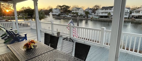 View from our porch of Sandlapper Lake and the fountains.  Tables seat 12