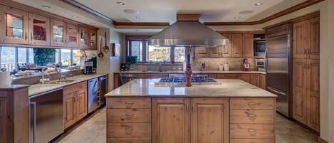 Kitchen with island and nearby sink