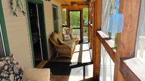 Left side of screened in porch.