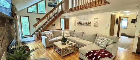 Large comfy sofa for gathering in front of the fireplace. 