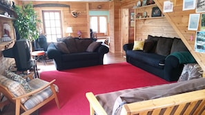 Red living room. With 4 large living rooms, there's tons of room for everyone!