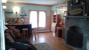 Green liv. room features 130 yr old stone fireplace, bar, karaoke machine. BYOB!