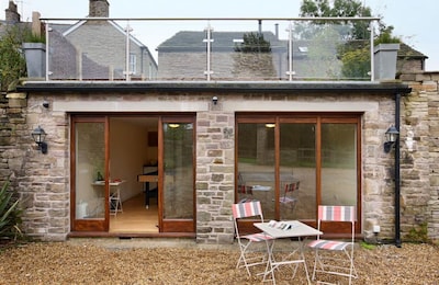 Orchard Cottage, on the Cheshire border, is an intriguing barn conversion in the Peak District.