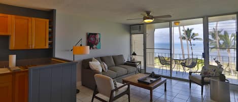 Open concept kitchen and living room with ocean views