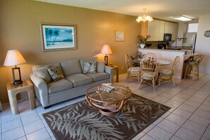 Living room open to dining area and kitchen