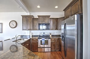 Kitchen - fully stocked with basic cookware.