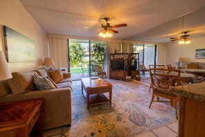 Open concept living area and walk out lanai