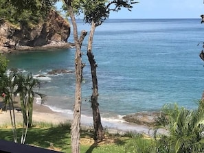 Steps from this semi-private beach