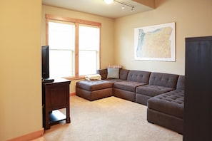 Family room with 50" flat screen TV,  cable, & DVDs