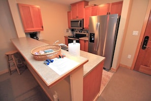 New stainless appliances in kitchen