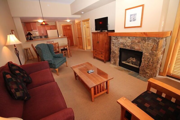 Spacious living room with vaulted celings