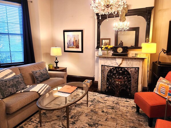 Classic Boston Brick row house with original details and a splash of Modernity
