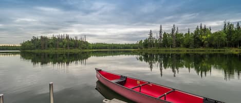 Life jackets and paddles can be found in the house.