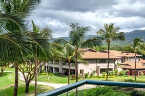 Wake up to rolling greens and waving palms right outside your lanai HKH-344