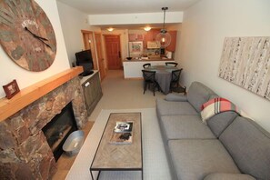 Fireplace and large flat screen TV in living room