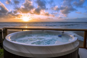 Hot Tub - The view can't get any better from your own private hot tub overlooking the sand and surf.