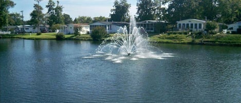 Beautiful Fountain view from the deck! Lake is stocked with fish! Bring ur pole!