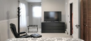 Smart TV with cable, including local channels, in primary bedroom.