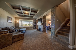 This cozy living room (plus fireplace) has plenty of space for the whole family 