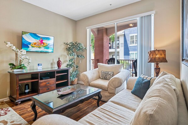 Comfy living room radiates casual elegance - Inviting you to sink into plush sofas and unwind. - A haven of relaxation where every corner whispers comfort  - Harmonious color scheme with pops of accent colors for visual interest