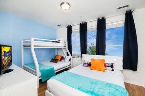 Featuring a cozy bed and a playful double decker, where dreams take flight and adventures come to life.