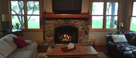 Fireplace with lake view.