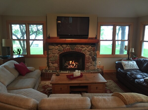 Fireplace with lake view.