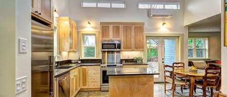 Kitchen w/double height ceiling
