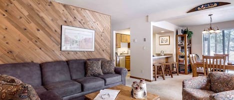 Open but cozy floorplan in the living, dining and kitchen areas.