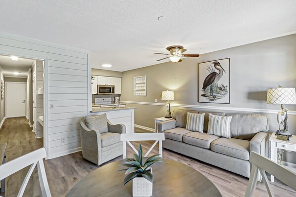 Living Room - Beautifully renovated 1 bedroom villa.  All new flooring, paint, furniture and featured ship lap wall.