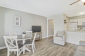 Dining area - Newly dining table will be perfect place for meals and family game nights.  And check out the featured shiplap wall!