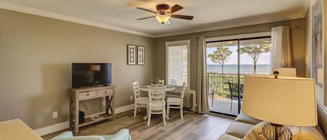 Living room/dining room - Beautifully renovated villa with living and dining combination.  Check out the view!