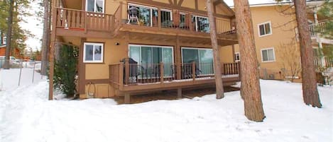 Snow covered Big Bear Cool Cabins, Lakefront Cottage front