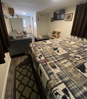 Full length view of cabin from king bed
