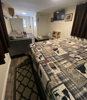 Full length view of cabin from king bed