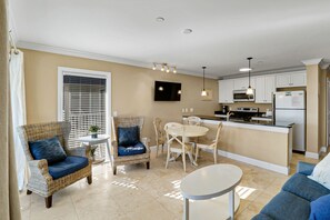 Kitchen/Living Room/Dining Room - This well appointed space offers comfort and efficiency in this oceanfront condo.