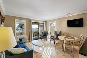 Living/Dining Room - Bright fresh furnishings make a pleasant environment for an oceanfront holiday.