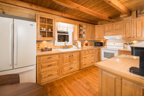 A well stocked kitchen perfect for dining in.