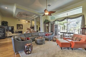 Relax while watching shows on the flat-screen cable TV.