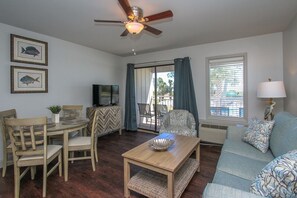 Living room - Renovated living room with flat screen TV. Enjoy the amazing view from your balcony .