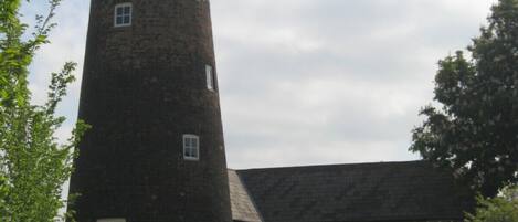 The Old Mill, Grade II listed 7 storey restored windmill . 