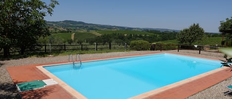 The 13x6m super panoramic swimming pool, with views on San Gimignano and hills