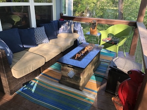 Enjoy the porch peace with firepit to take the chill off early mornings.