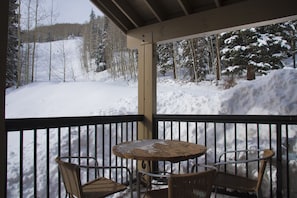 Beautiful views up the ski slope with a wrap around porch!