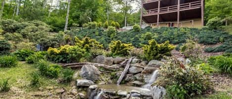 back yard with pond, on-demand water fall and extensive landscaping